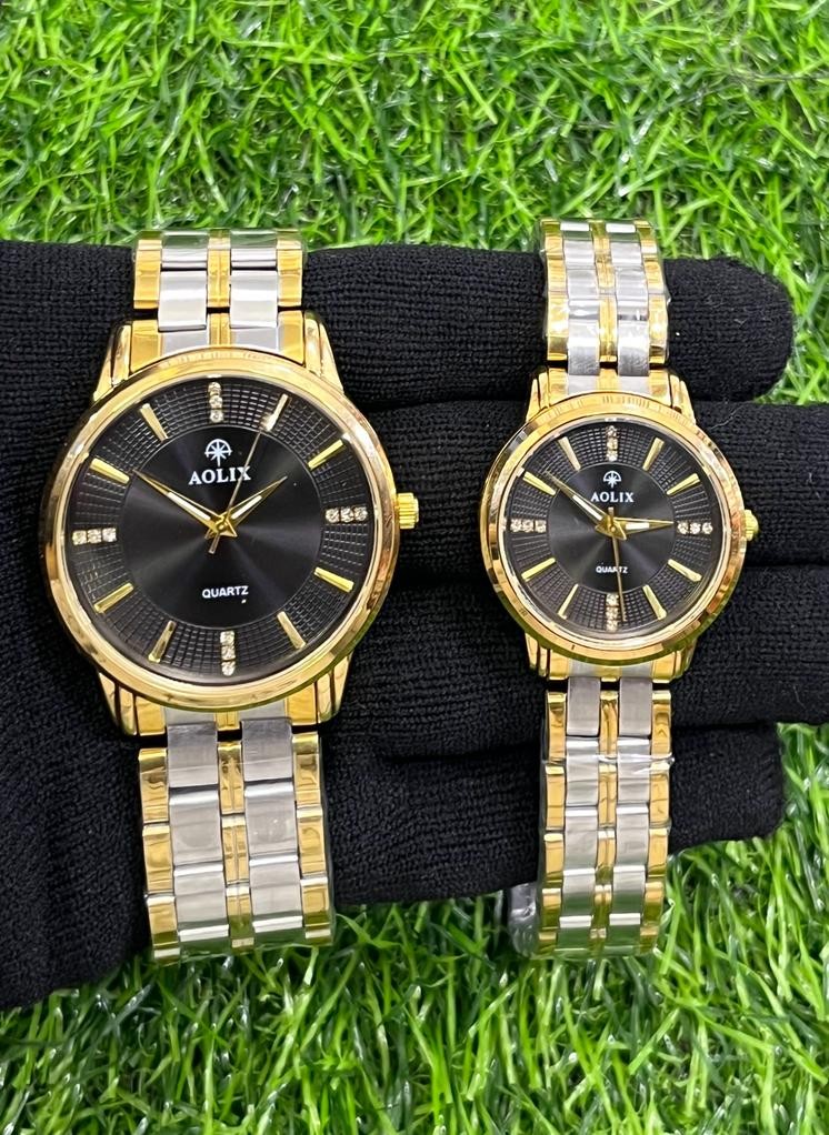 Couple watch. Two tone color. Bracelet color guaranteed (stainless steel).  90% waterproof , 100% water resistant.. Free watch box and (two batteries)..jpg